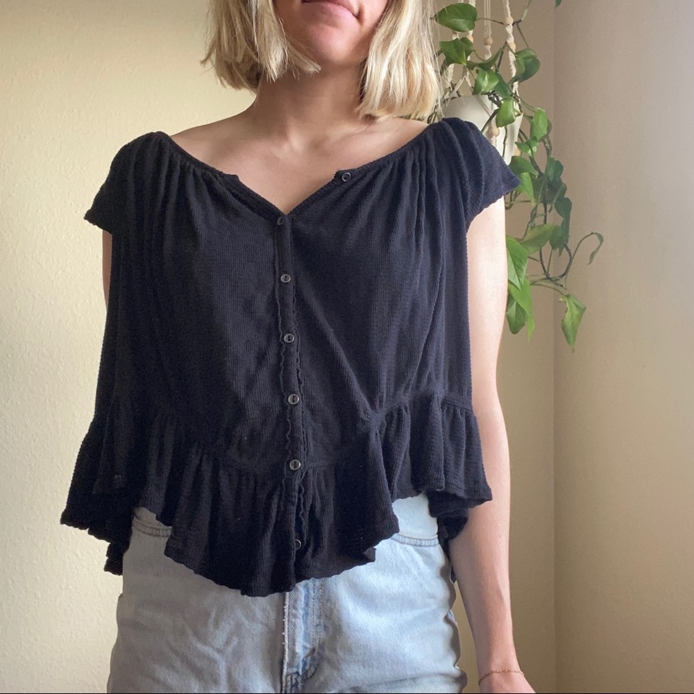Black Free people waffle textured top flowy top